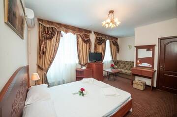 Корпус Б для 2 взрослых и 1 ребёнка в Гостинице Ас-Эль